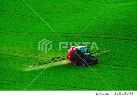 Farm machinery spraying insecticide 22923943