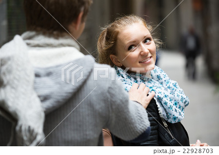 Flirting at the street. 22928703