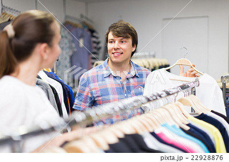 Couple doing shopping at the clothing store. Couple doing shopping at the clothing store. 22928876