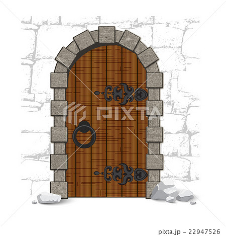 Old wooden vintage doors with stones 22947526