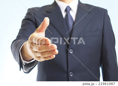 握手を求めるビジネスマンの写真素材