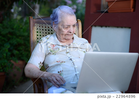 Grandma using a laptop 22964896