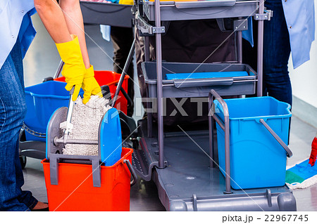 Cleaning ladies mopping floor 22967745