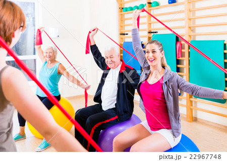 Senior people at fitness course in gym 22967748