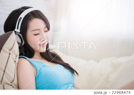 woman enjoying the music 22968474