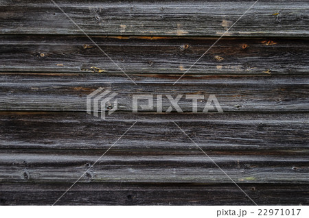 Old unpainted dark wooden boards background 22971017