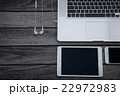 multiple devices phone laptop,tablet on wood 22972983