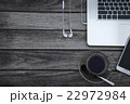 Coffee cup smart phone and laptop on wood table 22972984