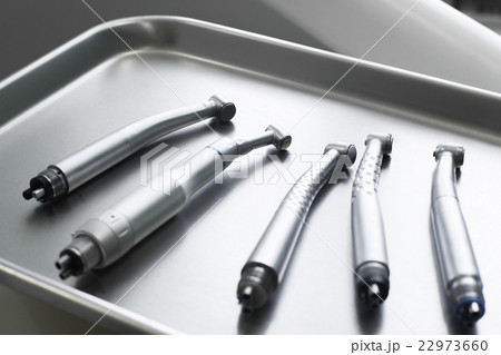 Dental turbine handpieces on metal tray closeup 22973660