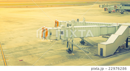 Airport terminal boarding gate . ( Filtered image processed vintage effect. ) Airport terminal boarding gate . ( Filtered image processed vintage effect. ) 22976286