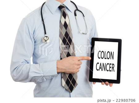 Doctor holding tablet - Colon cancer Doctor holding tablet - Colon cancer 22980706