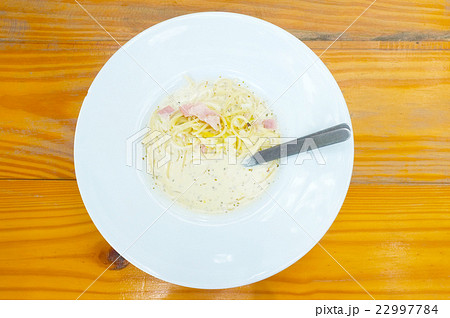 Spaghetti Bolognese with white cream sauce and ham 22997784