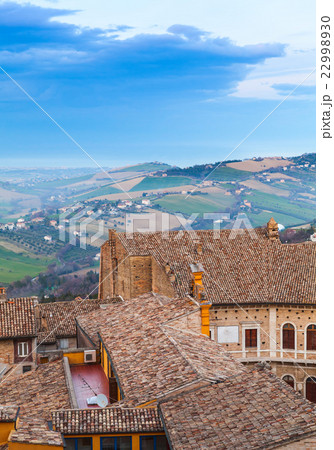 Fermo, Italy. Vertical photo with old tiling roofs Fermo, Italy. Vertical photo with old tiling roofs 22998930