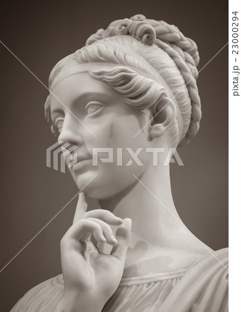 White marble head of young woman White marble head of young woman 23000294