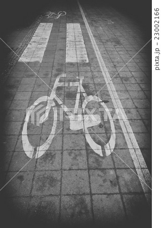 Bicycle lane signage on street, black and white Bicycle lane signage on street, black and white 23002166