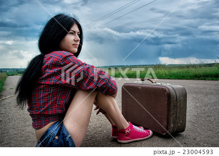 Beautiful girl stops the car 23004593