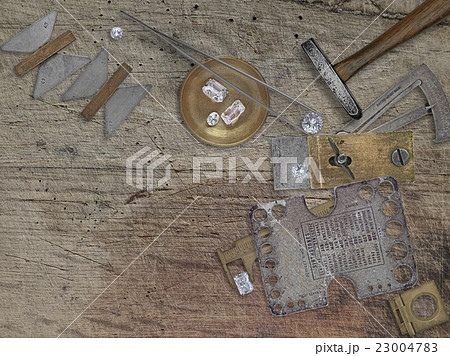 vintage jeweler tools over wooden bench vintage jeweler tools over wooden bench 23004783