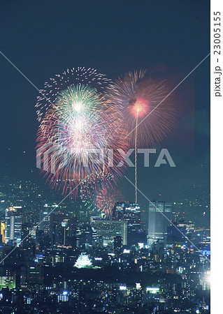 大阪城天守閣となにわ淀川花火の写真素材