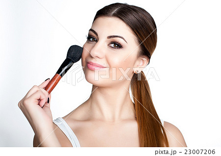 Emotional portrait of a young beautiful girl  23007206