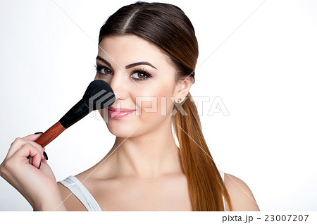 Emotional portrait of a young beautiful girl  23007207