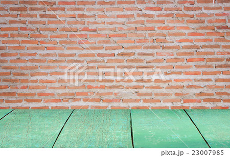 Empty wooden board on brick background 23007985