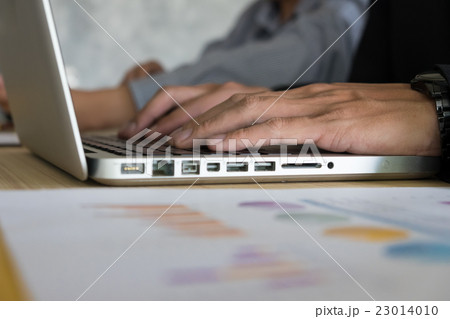 Close-up of young female hands pressing laptop Close-up of young female hands pressing laptop 23014010