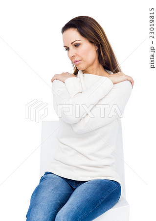 Desperate woman crossing arms on shoulders on white background 23019815