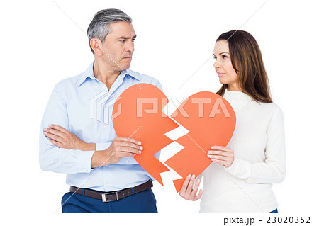 Couple holding broken heart Couple holding broken heart 23020352