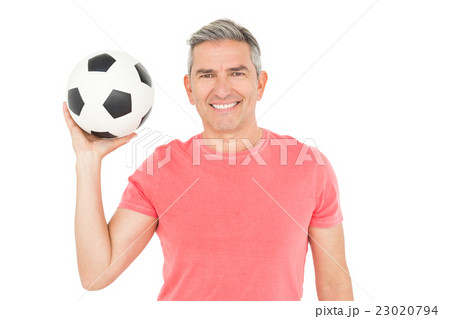 Happy football fan holding ball Happy football fan holding ball 23020794