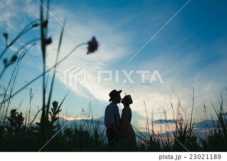 Young couple in love in the meadow Young couple in love in the meadow 23021189