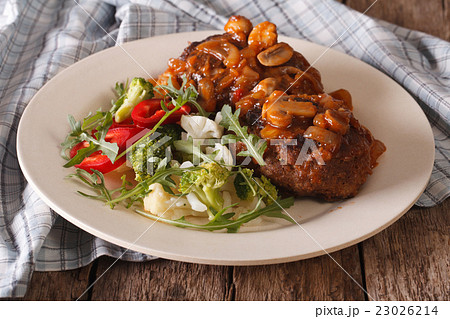 Salisbury steak with mushroom sauce and vegetable 23026214