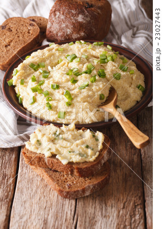 Homemade forshmak and rye bread close-up. vertical Homemade forshmak and rye bread close-up. vertical 23027443