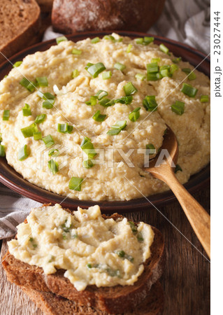 Jewish forshmak with rye bread macro on a plate Jewish forshmak with rye bread macro on a plate 23027444