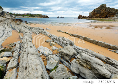 Portio Beach coastline landscape. 23028913