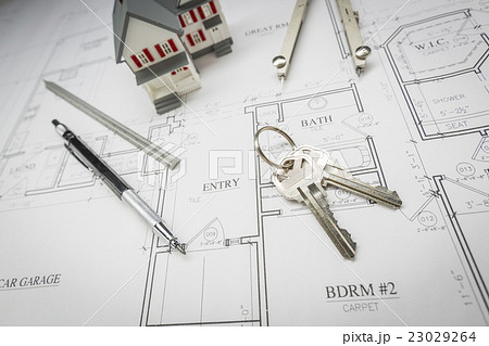 Home, Pencil, Compass, Ruler and Keys On Plans Home, Pencil, Compass, Ruler and Keys On Plans 23029264