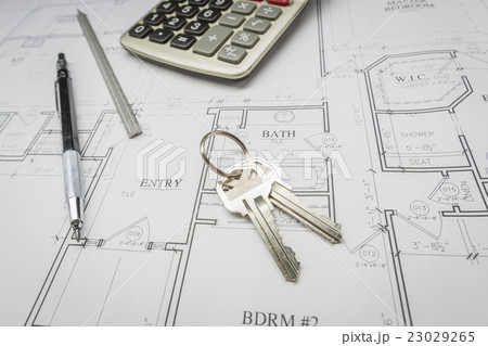 Pencil, Ruler, Calculator and Keys on House Plans Pencil, Ruler, Calculator and Keys on House Plans 23029265