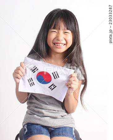 Cute girl holding Korea Flag 23033287