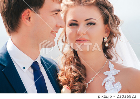 couple posing in the park on a background nature 23036922