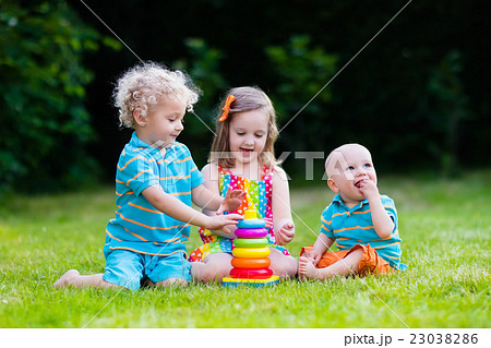 Children playing with toy pyramid Children playing with toy pyramid 23038286