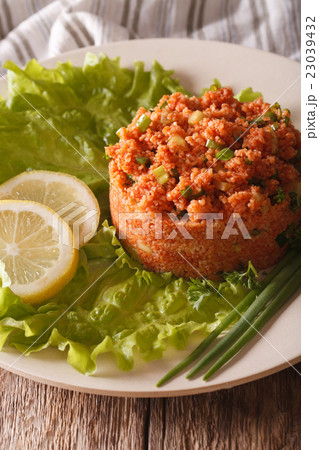Turkish appetizer spicy Kisir closeup on the table Turkish appetizer spicy Kisir closeup on the table 23039432