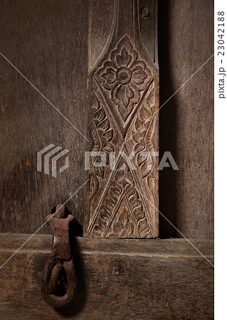 carve door and padlock in ancient thai house carve door and padlock in ancient thai house 23042188