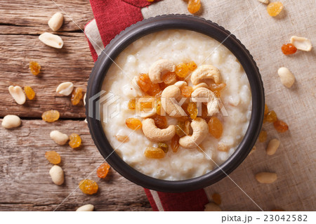 Indian kheer rice pudding with nuts and raisins 23042582
