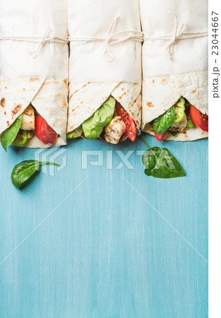 Healthy lunch snack. Tortilla wraps with grilled 23044667
