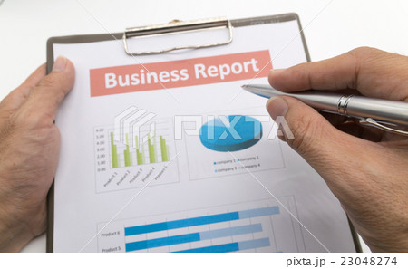 business report and man hand. business report and man hand. 23048274