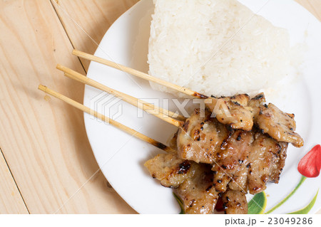 Thai grilled pork and Sticky rice 23049286