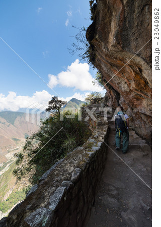 Backpacker exploring Inca Trail Machu Picchu, Peru 23049862