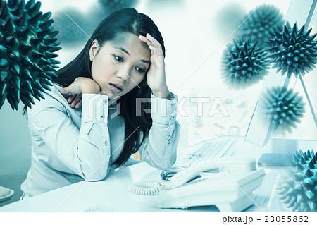 Composite image of unsmiling businesswoman with hands on face 23055862