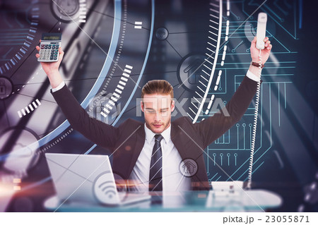 Composite image of businessman cheering holding calculator and t Composite image of businessman cheering holding calculator and t 23055871