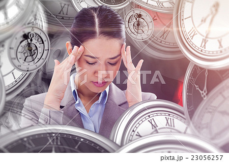 Composite image of portrait of a beautiful businesswoman having Composite image of portrait of a beautiful businesswoman having 23056257