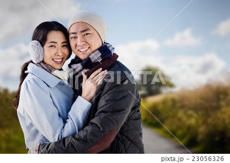 Composite image of portrait of couple embracing Composite image of portrait of couple embracing 23056326